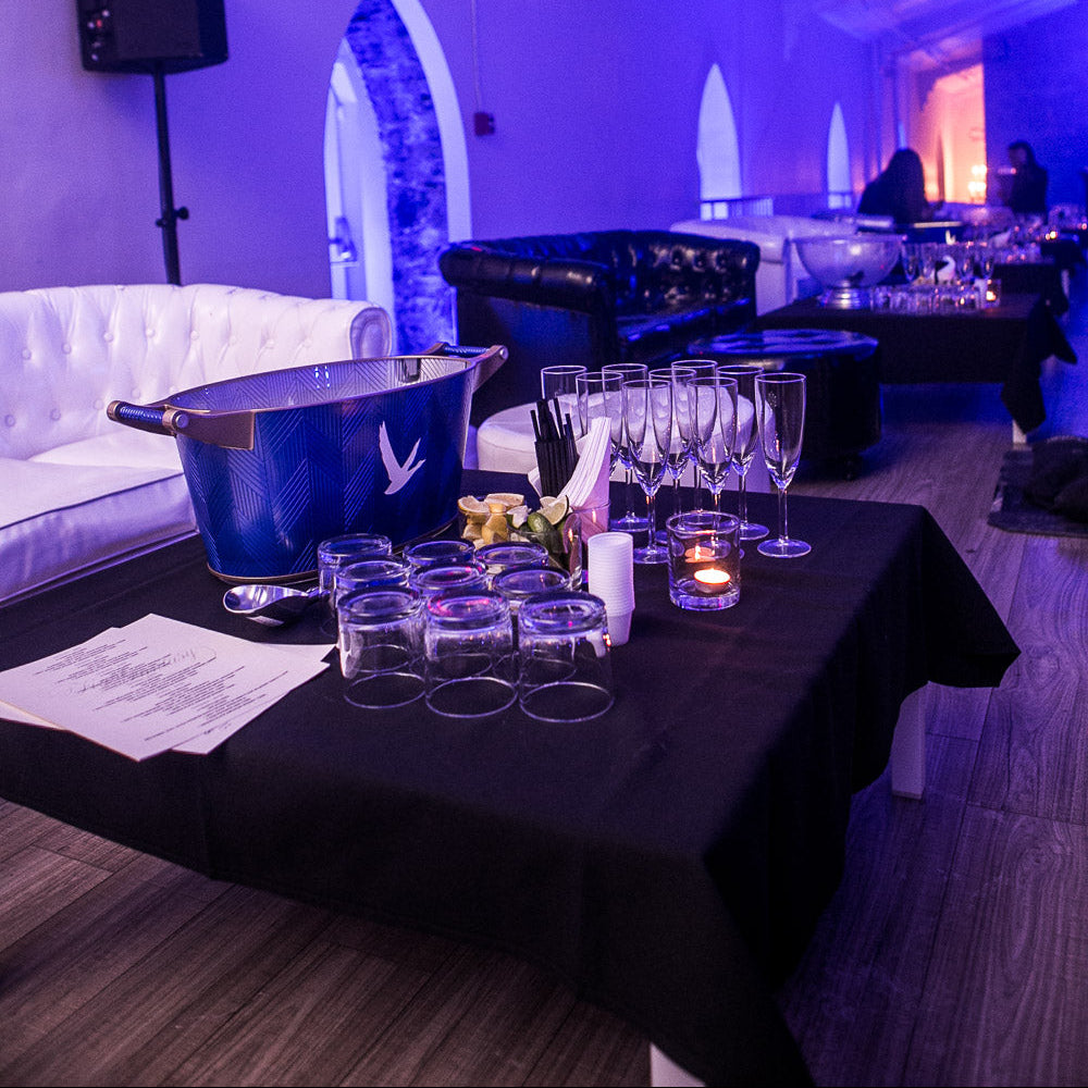 VIP mezzanine lounge seating with bottle service setup at Final Fantasy New Year’s Eve party in Montreal at Salon Richmond.